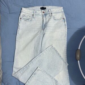 Women’s rhinestone covered loose fit jeans.